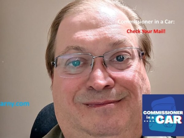 Commissioner in a Car: Check Your&nbsp;Mail