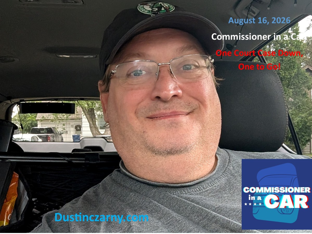Commissioner in a Car: One Court Case Down, One to&nbsp;Go!